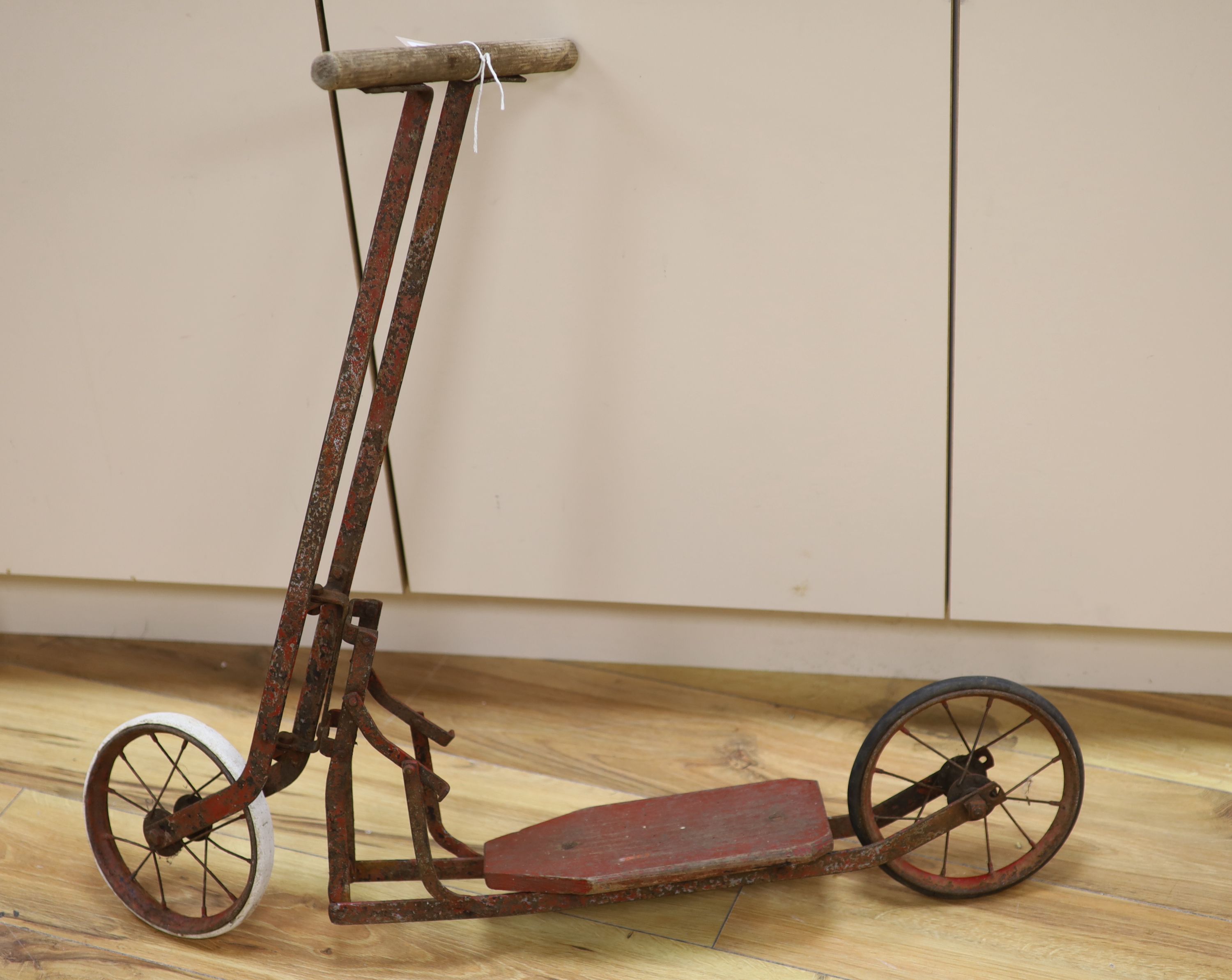 A childs folding scooter